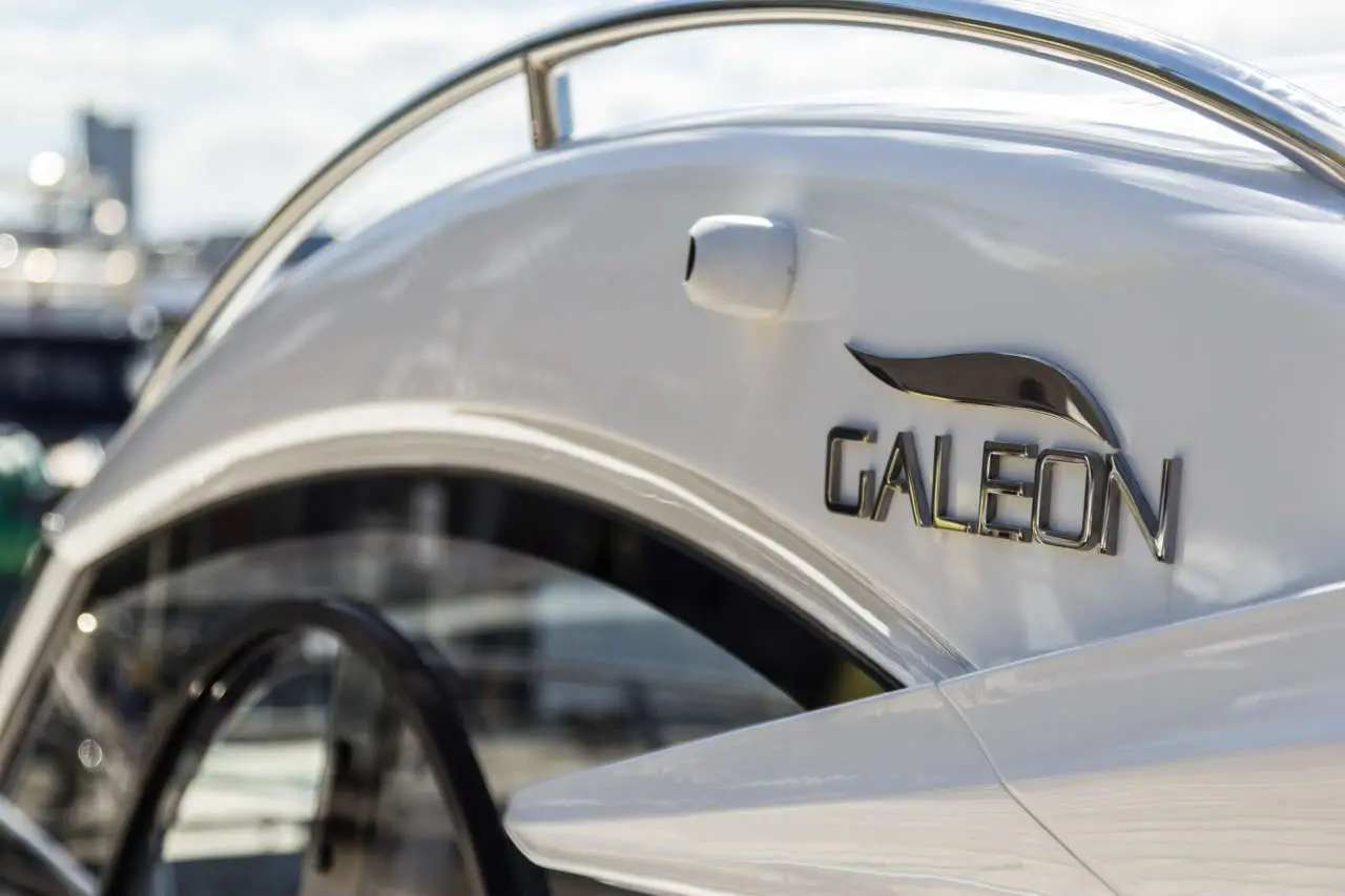 Close-up of a sleek white boat with the 