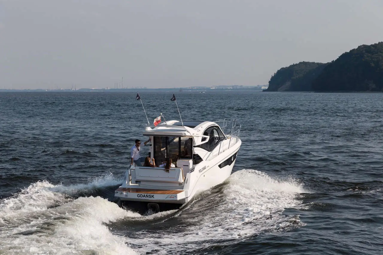 A white motorboat named 