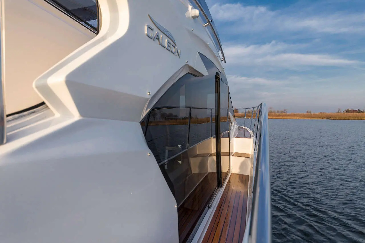 A sleek yacht, branded 