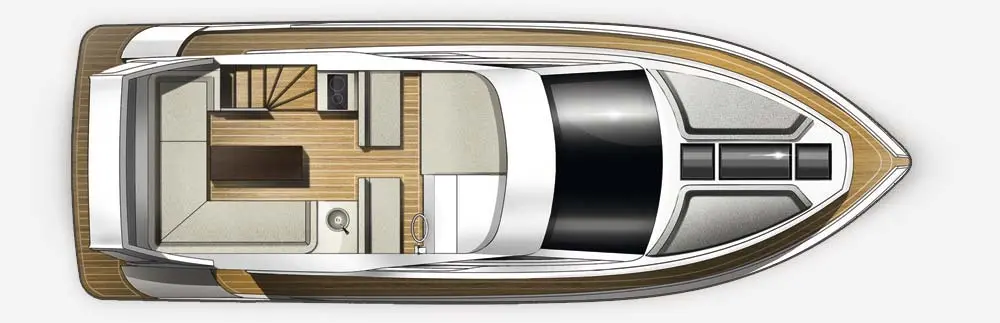 Top view of a stylish boat interior with a steering area, seating, and a small kitchen space. Wood and metallic elements featured.