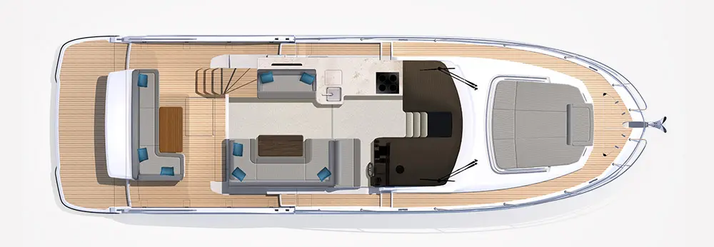 Top view of a boat interior, featuring seating areas, a small table, and a galley with a cooktop and fridge.