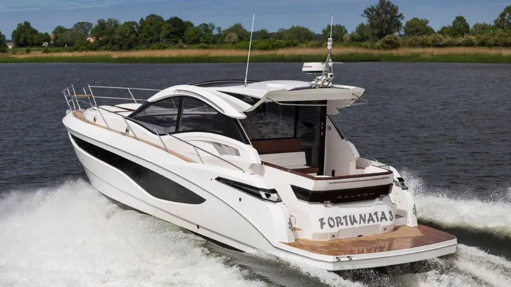 A sleek white motorboat named 