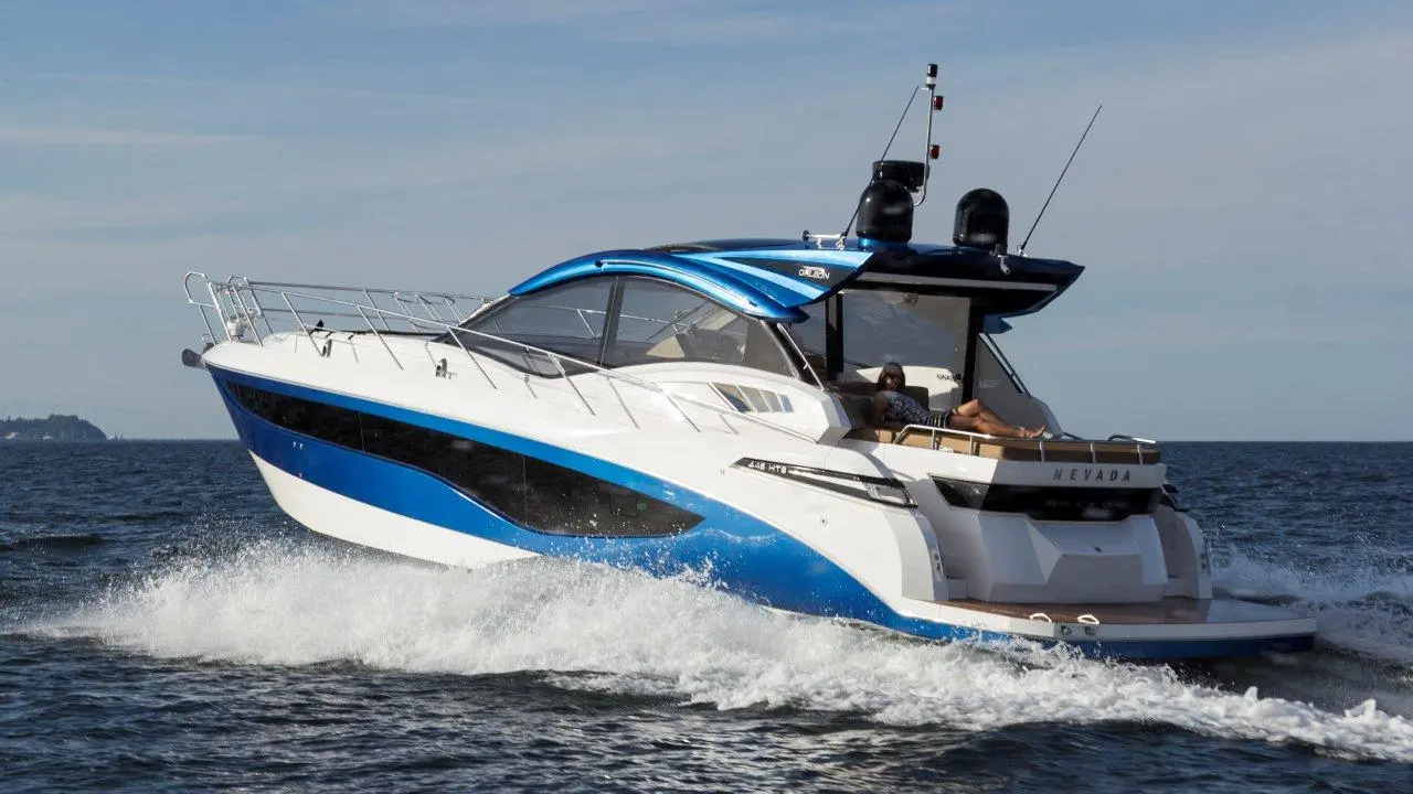 A sporty blue and white motorboat named 
