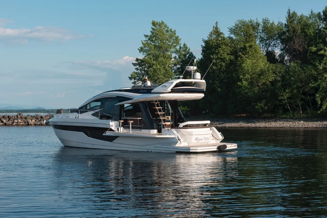 A sleek white and black yacht named 