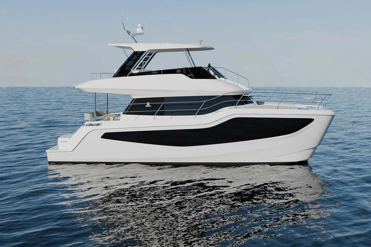 A modern motor yacht with a sleek white and black design, floating on calm waters under a clear sky.