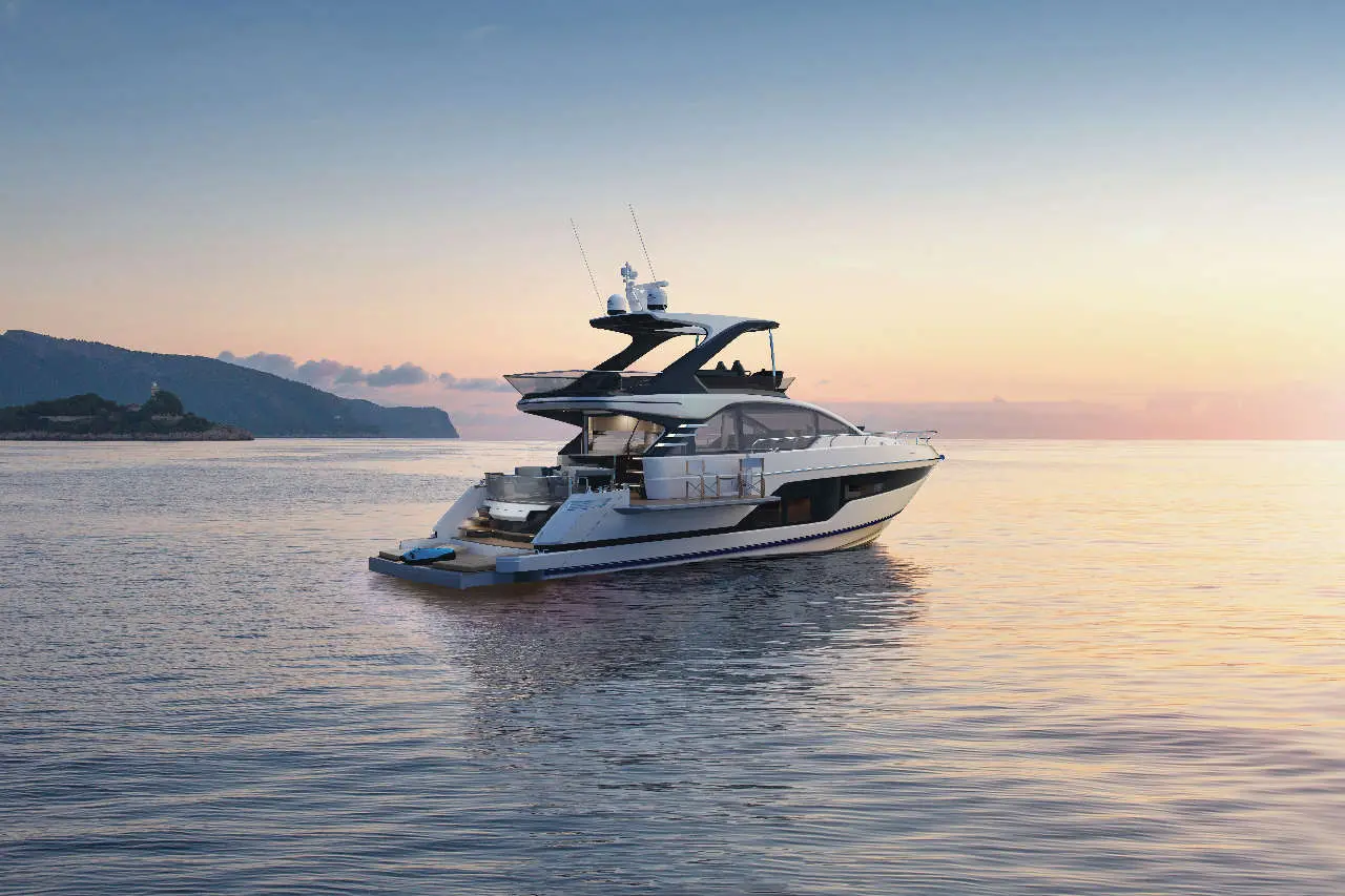 Luxury yacht anchored in calm waters at sunset, with a scenic coastal backdrop and soft pastel sky hues.