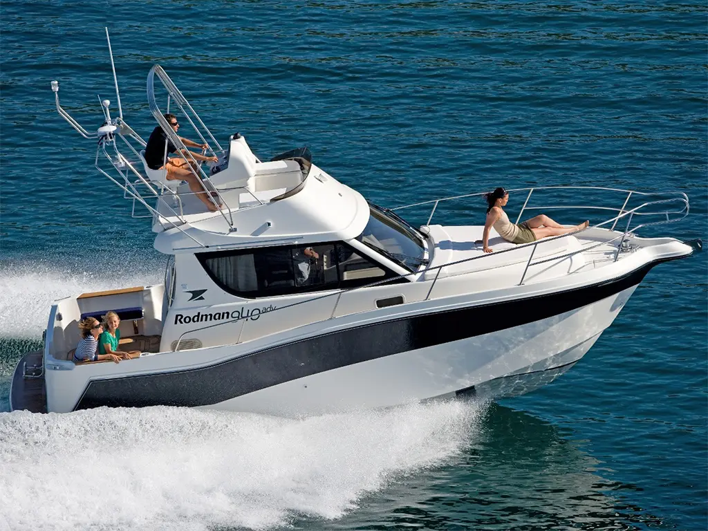 A white motorboat labelled 