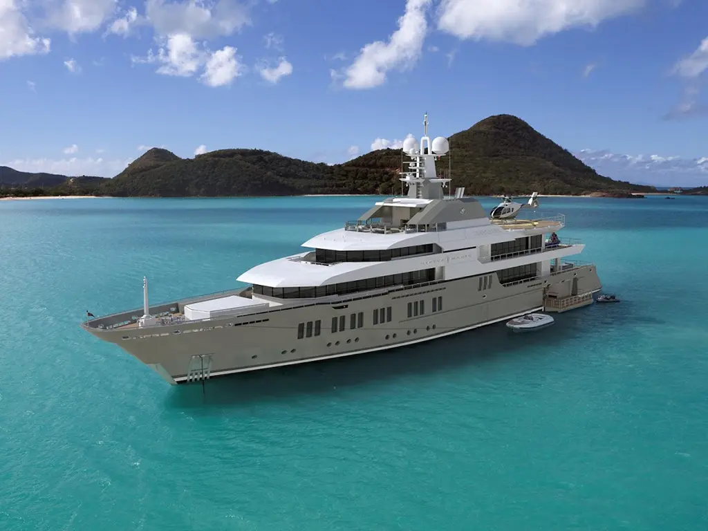 A large luxury yacht anchored in turquoise waters with lush green hills in the background under a clear blue sky.