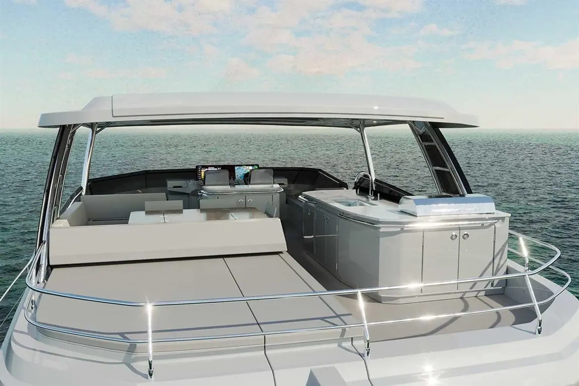Luxury yacht deck with seating, wet bar, and navigation displays, set against a serene ocean and sky backdrop.
