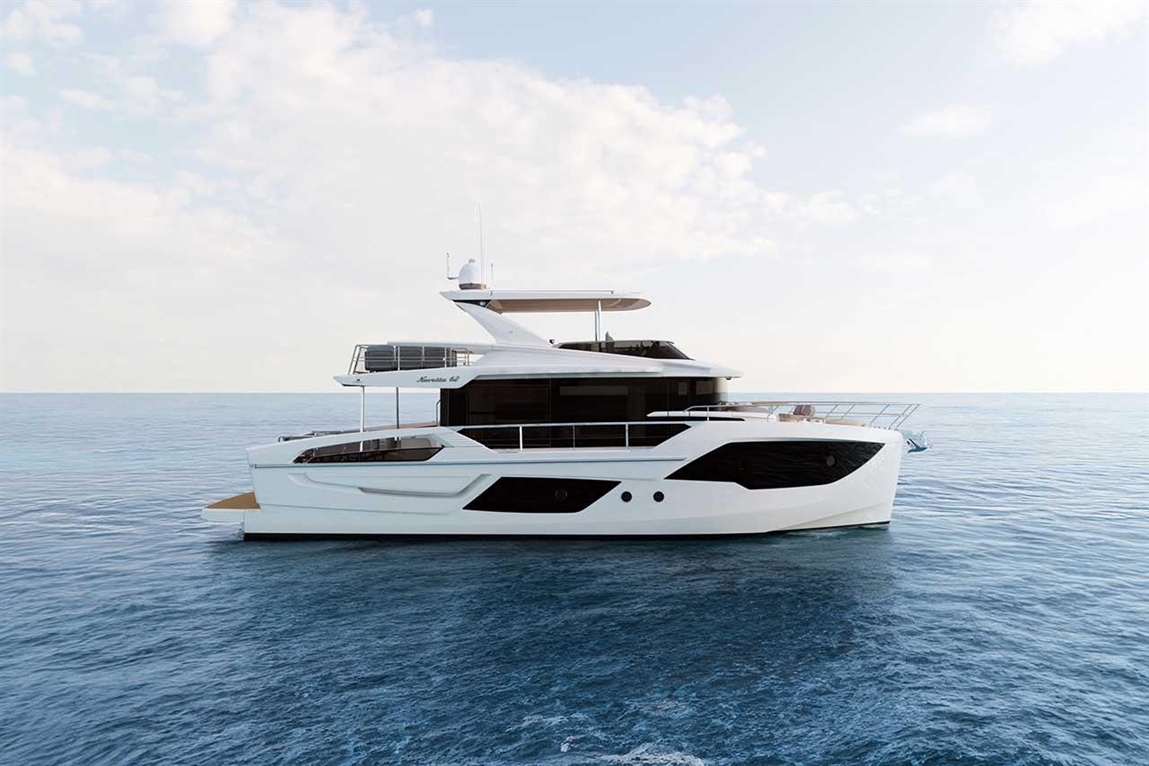 Luxury yacht Navetta 42 sailing on calm waters, showcasing a sleek white and black design against a clear sky.