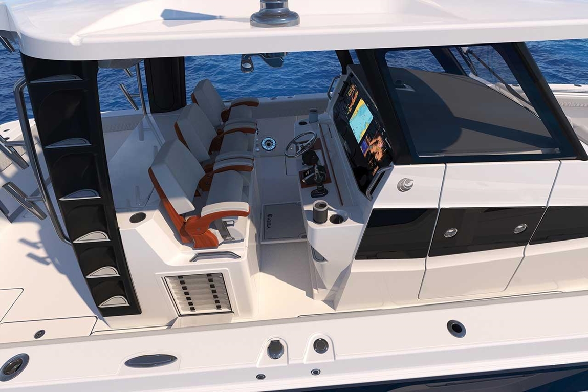 Boat cockpit featuring two helm chairs, steering wheel, and an electronic display, overlooking the calm blue water.