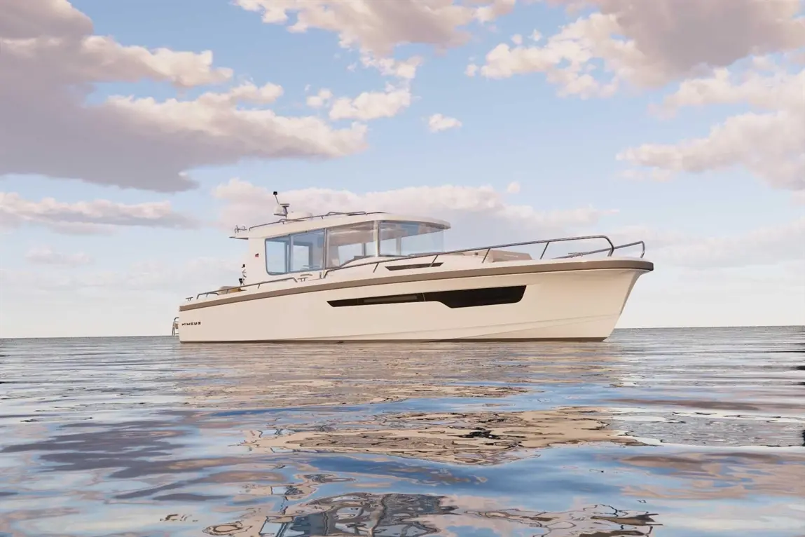 Modern white boat with a glass cabin, floating on calm water under a blue sky with scattered clouds.