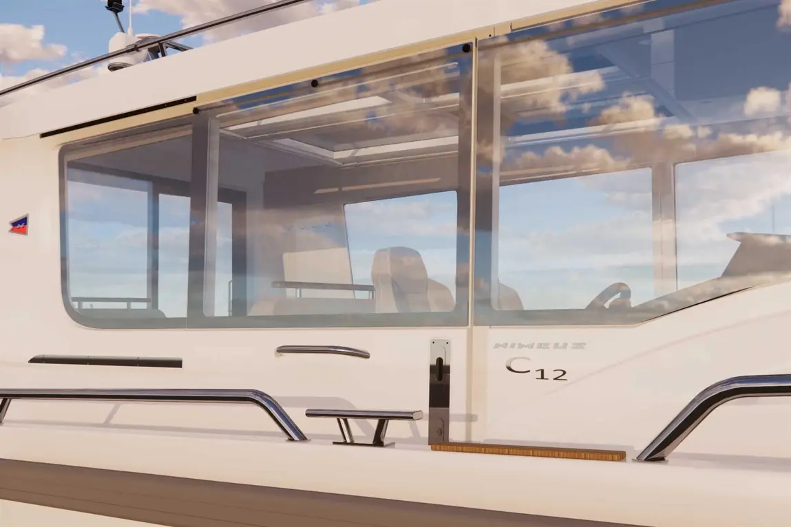 Nimbus C12 boat cabin features large windows reflecting clouds, chrome handrails, and modern seating for enhanced navigation.