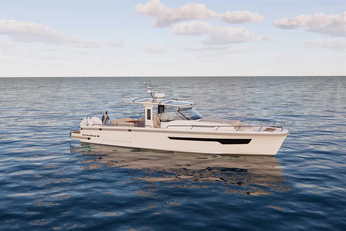 A sleek white Nimbus boat floats on calm waters under a clear sky with soft clouds, showcasing modern design and elegance.