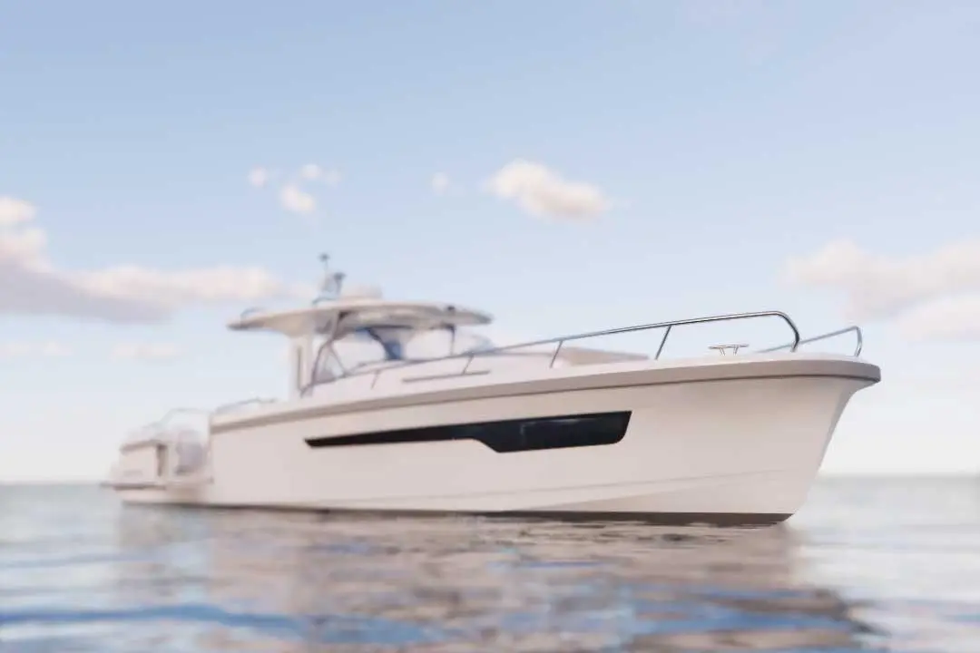 A sleek white motorboat with a modern design, floating on calm water under a blue sky with scattered clouds.