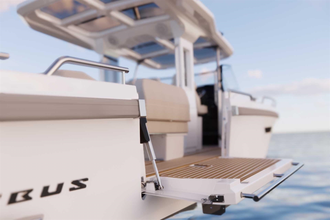 A close-up of a boat's rear platform with a wooden deck and stainless steel railing against a serene water background.