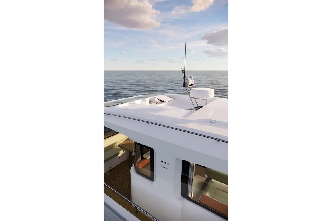 The top of a yacht shows the navigation equipment, with calm waters and a cream sky in the background, labelled '495'.