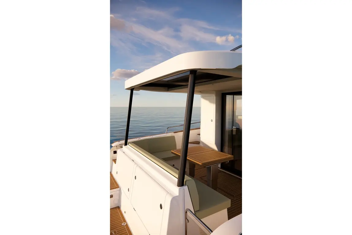 Contemporary yacht interior featuring a shaded seating area and wooden table overlooking calm waters under a blue sky.