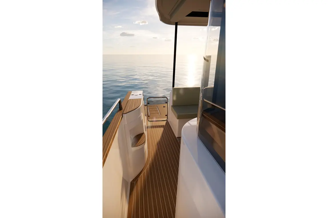 Serene boat interior with wooden flooring, a seat, and panoramic view of calm waters under a bright sky.