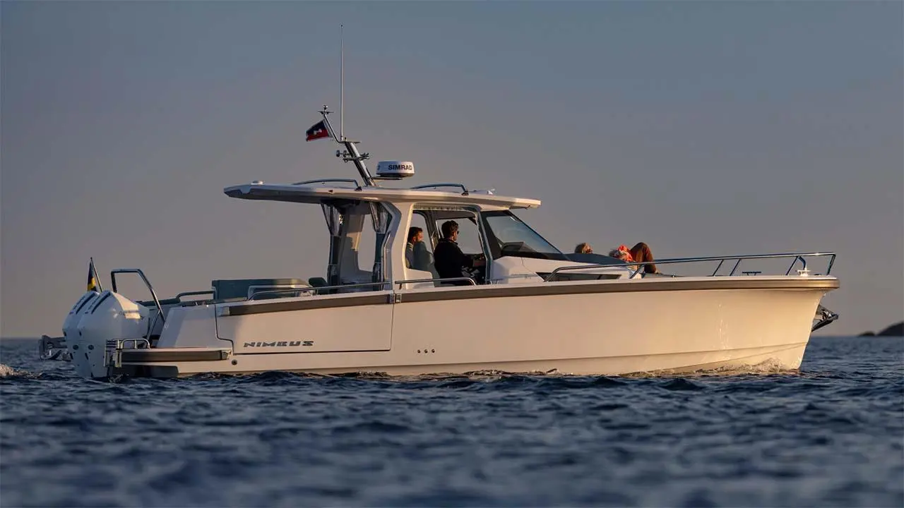 NIMBUS SPORTS TENDER 35 motorboat cruising at sea with passengers aboard; SIMRAD equipment visible.