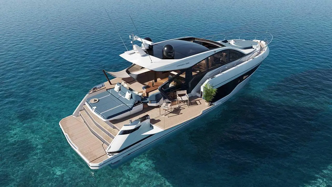 FAIRLINE TARGA 58 GTO luxury motor yacht viewed from above on clear turquoise sea.